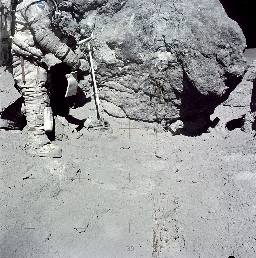 Charles Duke collecting sediment samples on the moon