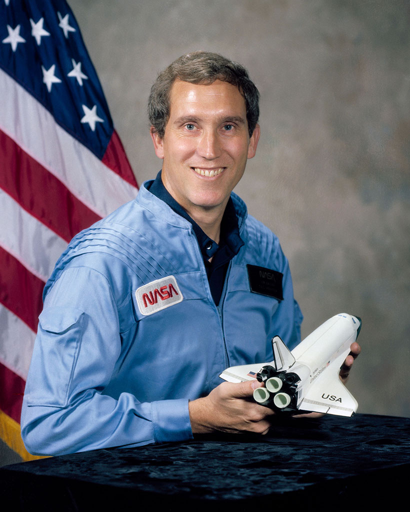 Photo of Michael Smith in a flightsuit